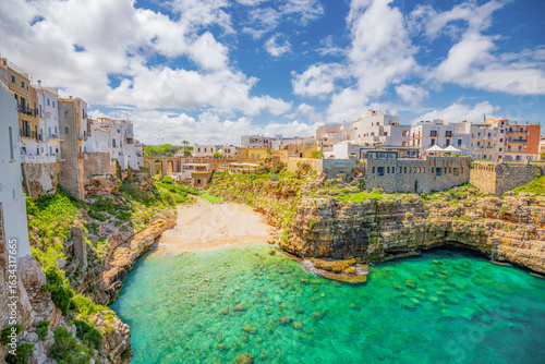 Fototapeta Naklejka Na Ścianę i Meble -  View of Polignano a Mare beach in Italy. Top tourist destinations in Italy. Trip to Europe.