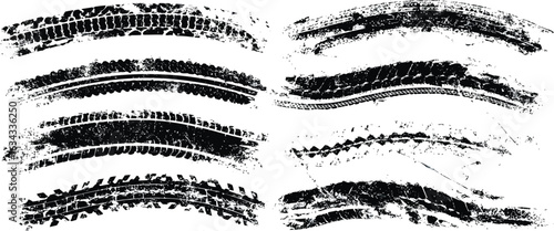 Collection of isolated black grunge tire track marks. Set of various dirty tread paths and curved textures for graphic design.