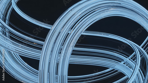 Intertwined light blue rings on dark background.
