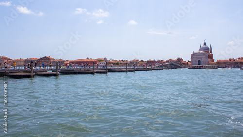 View of the Venetian Laguna, seen from the Giudecca Island; in the background the luxury Hilton Hotel. Worldwide famous, Venezia is a unique kind of city and UNESCO site.