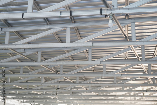 Modern industrial steel structure showing complex geometric ceiling design and construction elements