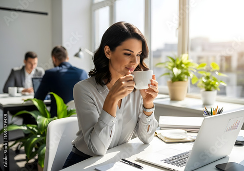 Solo professional with coffee & laptop