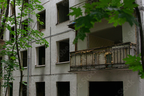 Wallpaper Mural An old panel house slated for demolition: windows without glass, an old rusty balcony Torontodigital.ca
