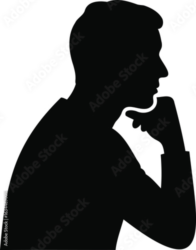 Silhouette of a pensive man deep in thought pondering a solution to a problem or considering a new idea