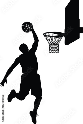 Silhouette of a basketball player performing a slam dunk during a game with a hoop in the background