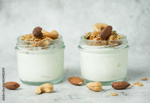 Close up of healthy food yogurt with muesli and granola.