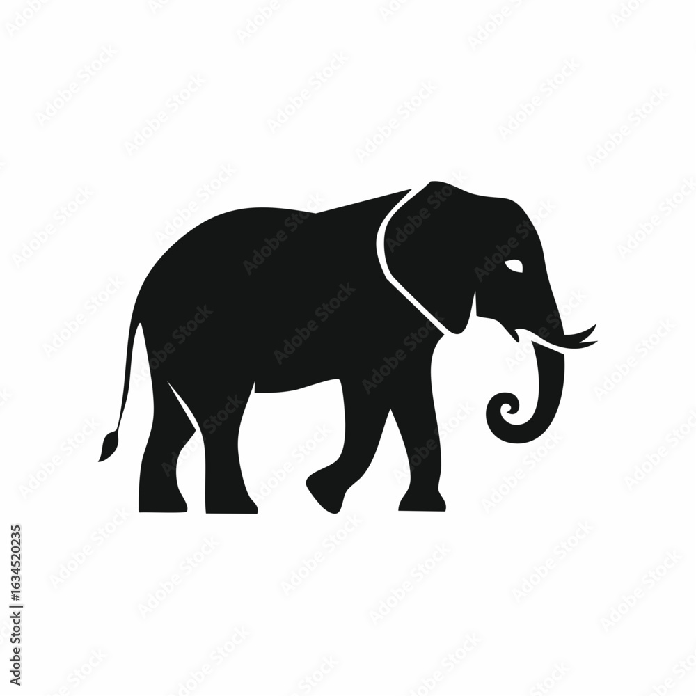 Fototapeta premium A flat silhouette of an elephant in profile view, walking with a raised trunk and tusks. Vector graphic icon for wildlife and nature themes.
