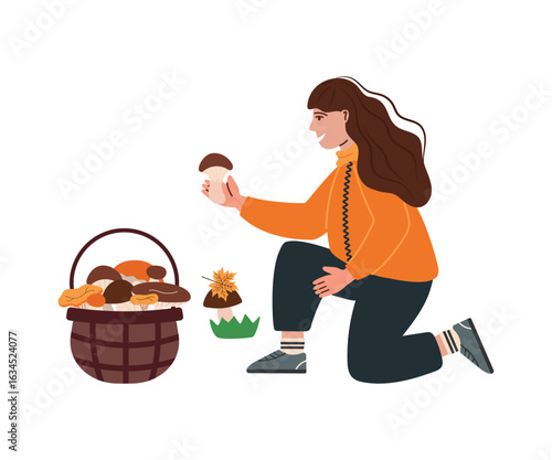 Woman picking mushrooms in a basket. Happy mushroom picker picking seasonal mushrooms.