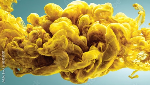 Abstract close-up of a vibrant, swirling mass of golden yellow ink