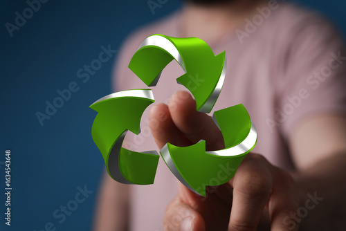 Hand holding a 3D recycle s...