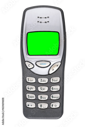 Wallpaper Mural Classic mobile phone from the early 2000s with green screen isolated on white background. Torontodigital.ca