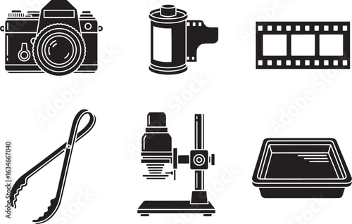 Vector art of collection of vintage photographic equipment and film isolated on white background