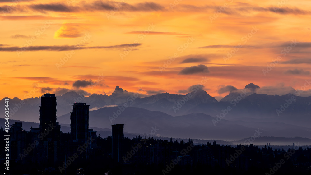 Fototapeta premium Sunset and sunrise views from Concord Brentwood Hillside East tower in Burnaby, BC, Canada