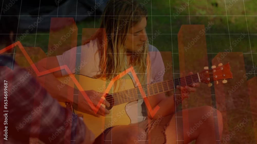 Guitarist lifting guitar strumming chords in music showing red graph pulsing grid syncing tempo