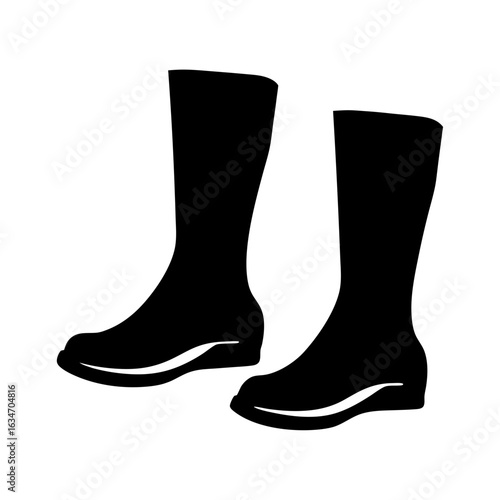 Two black rubber boots with defined soles isolated on white background