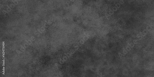 Black grunge background with grains. Old paper texture background. Rough textures with gritty noise. Stains and scratches Grunge background. polished stone pattern.	