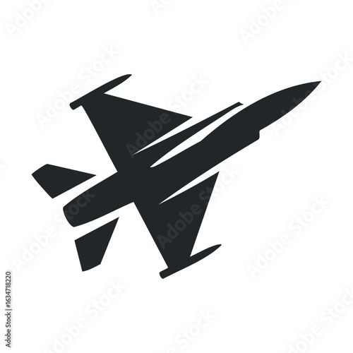 Silhouette of military fighter jet in flight
