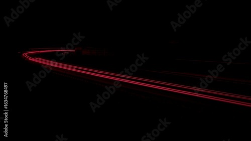 lights of cars driving at night. long exposure