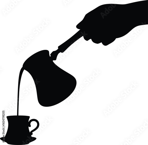 Silhouette of Hand Pouring Coffee from Turkish Pot into Cup