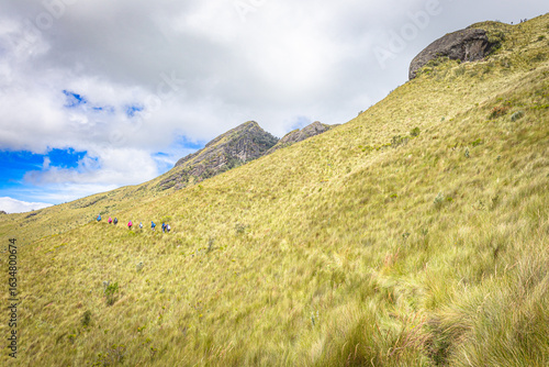 Pichincha Province, Quito, Ecuador - July 5, 2025: Hikers climb to the summit of Pasochoa Volcano, in the Pasochoa Wildlife Refuge. It is an extinct volcano, 4,200 meters high.