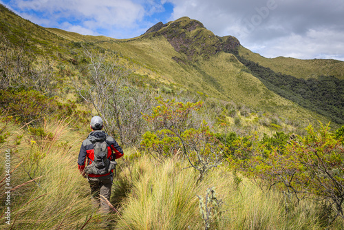 Pichincha Province, Quito, Ecuador - July 5, 2025: Hikers climb to the summit of Pasochoa Volcano, in the Pasochoa Wildlife Refuge. It is an extinct volcano, 4,200 meters high.