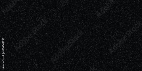 Granular black texture depicting a dense formation evoking the impression of rough surfaces with a complex and textured visual representation