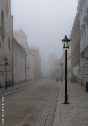 Grodzka street on foggy morning, Krakow old town, Poland