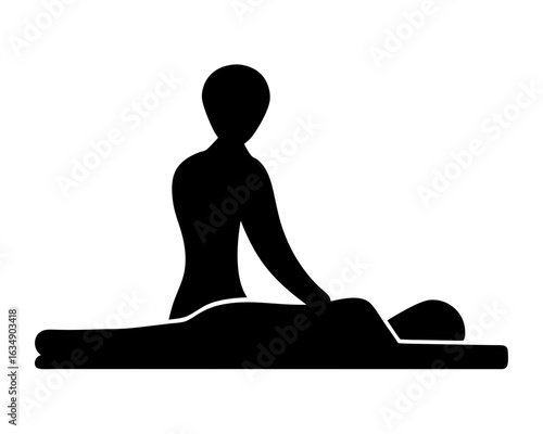 Silhouette image of a massage therapist giving a relaxing back massage