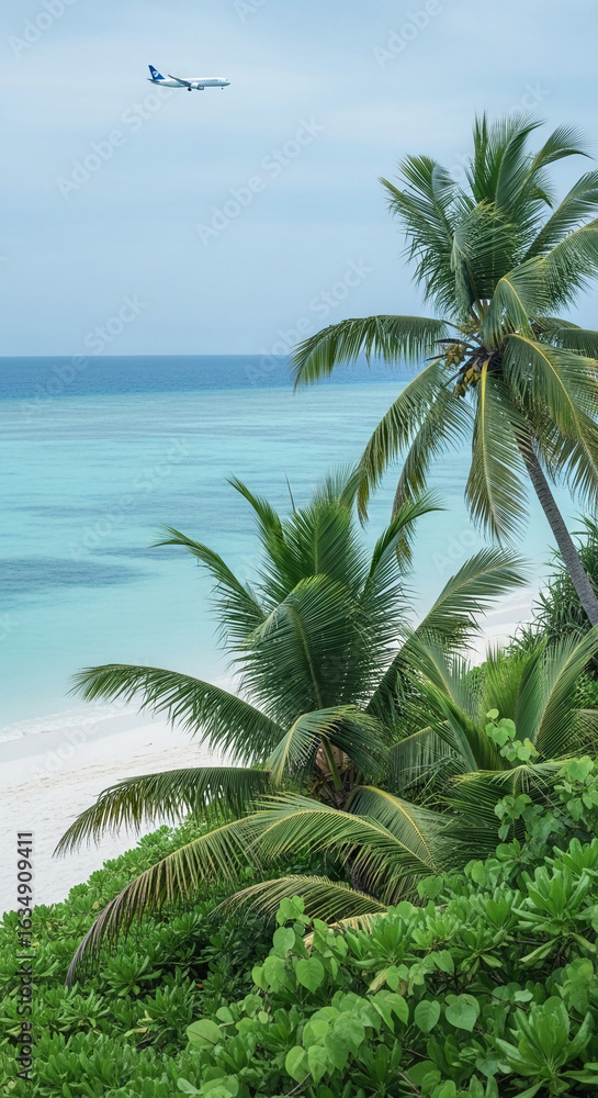 Fototapeta premium Tropical beach scene with palm trees, turquoise water, and airplane overhead, showcasing serene travel or vacation concept