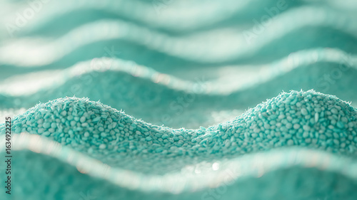 Teal granular material, wavy texture.
