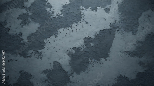 Textured gray wall with mottled patterns.
