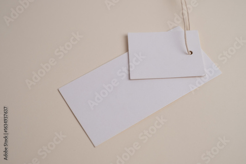 Mockup of clothing tag on color background. clothing brand concept