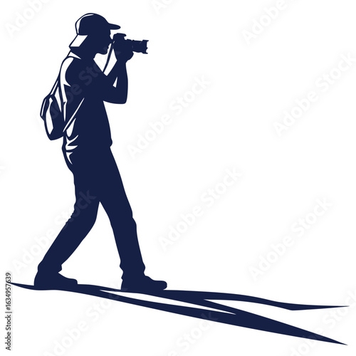 Silhouette Of A Photographer Holding A Camera