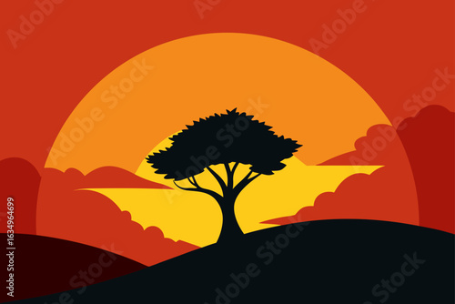 Silhouette of a lone tree against a vibrant sunset sky