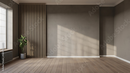 Empty room with wooden floors, neutral walls, and natural light.
