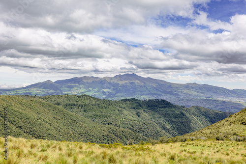 Pichincha Province, Quito, Ecuador - July 5, 2025: View of the Pichincha Integral, heart Volcano, among others, from the Pasochoa Volcano, in the Pasochoa Wildlife Refuge.