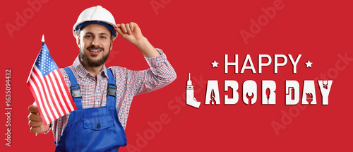 Male worker in hardhat with...