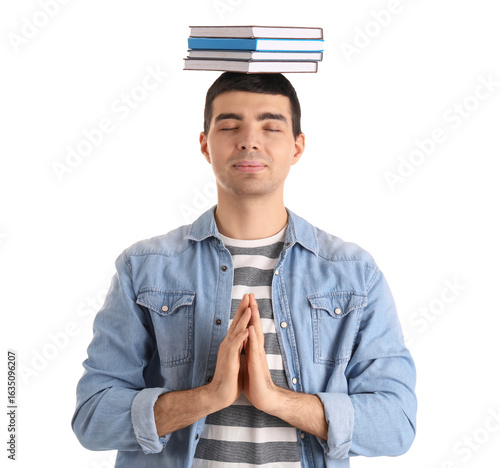 Young man with books medita...