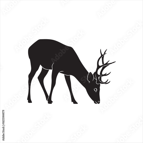 Black silhouette of a deer with antlers grazing white