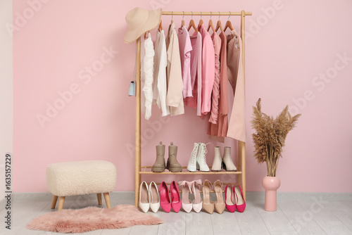 Wooden clothes rack with Va...