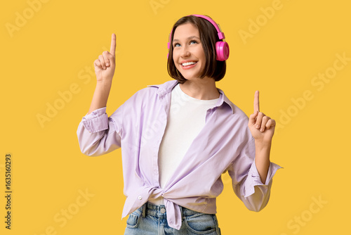 Smiling young woman in pink...
