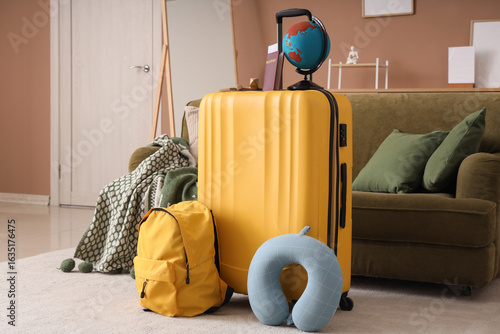 Suitcase with traveling acc...