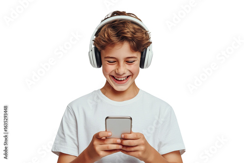 Isolated teen boy smiles, uses phone while wearing headphones. Stock for product photography, branding, posters.