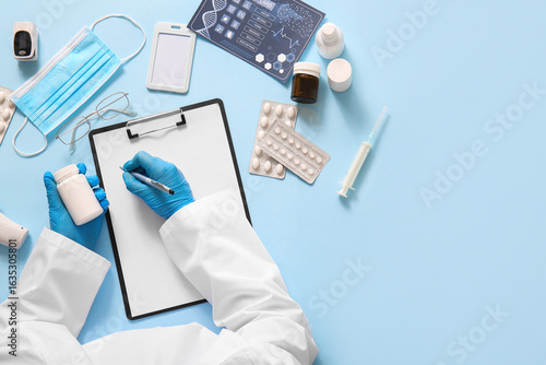 Doctor with clipboard, medi...