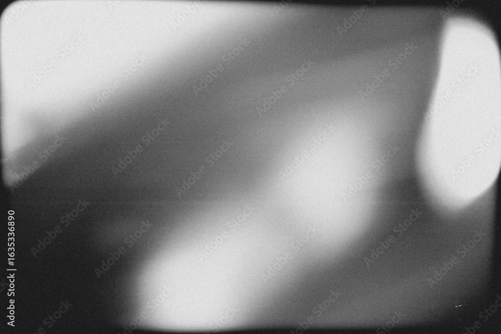 Obraz premium retro film overlay effect with scratch dust and light leaks,retro grain noisy film distressed texture light leak flare on black background,Black and white background