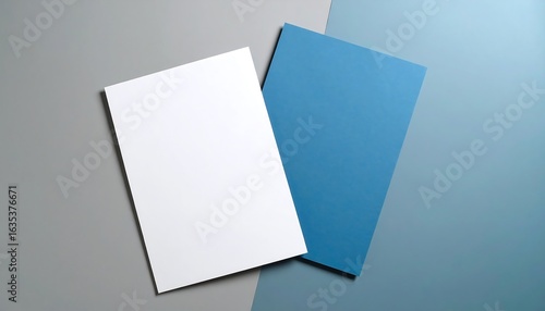 Blank white and blue papers on a gray and blue background