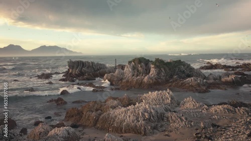 Interesting rocky shapes on the shoreline of a New Zealand beach