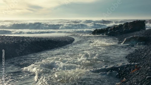 A small stream heading out into the ocean