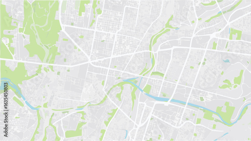Vector aerial view of a city map with green spaces and a river running through it in a light color palette