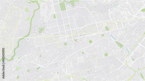 Vector aerial view of a city map with roads, green spaces, and a winding river in a light color palette